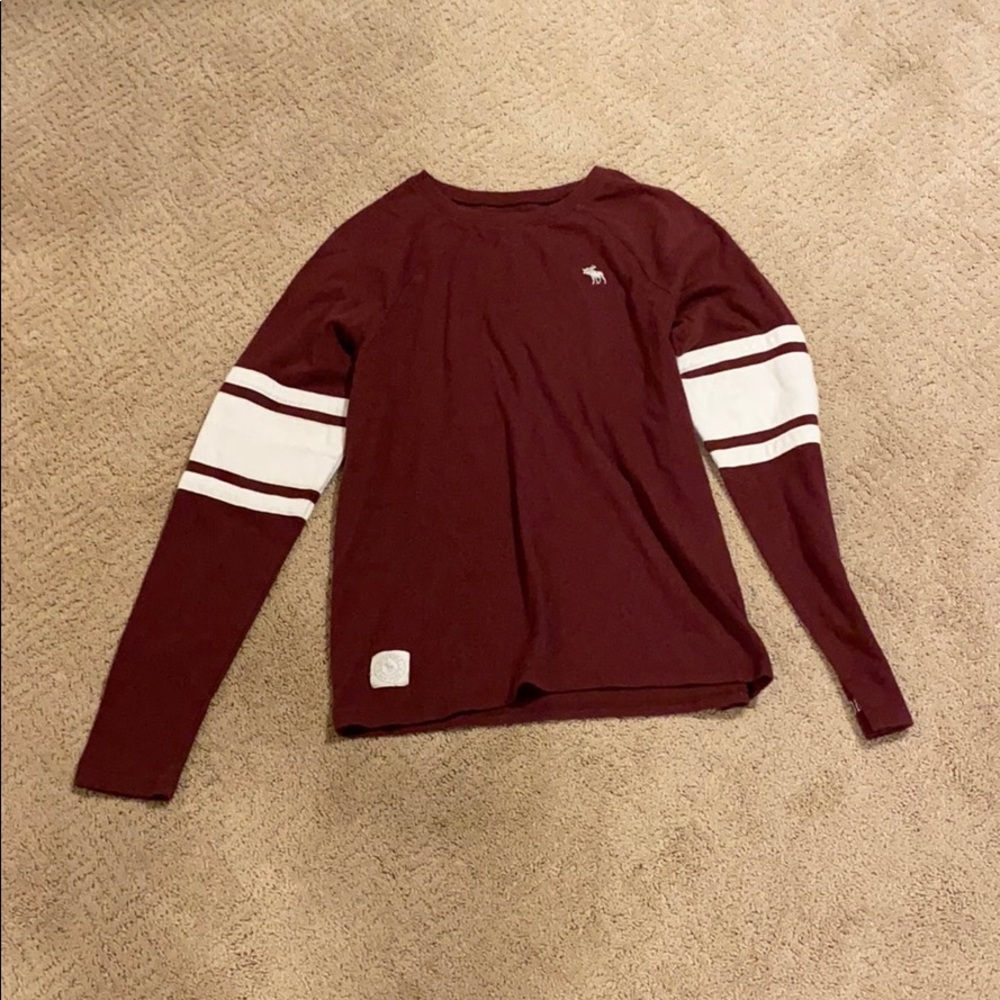 I am selling a maroon long sleeve T-shirt.